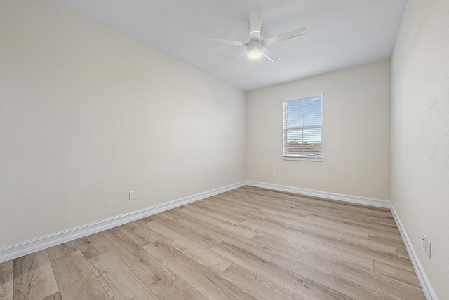 4770 SW Ardsley Dr, Stuart, FL 34997 - empty room with light wood-type flooring, a ceiling fan, and baseboards