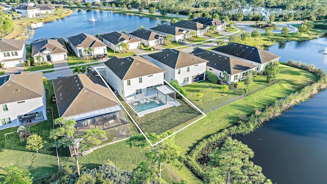 4770 SW Ardsley Dr, Stuart, FL 34997 - aerial perspective of suburban area with a large body of water