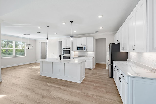 4770 SW Ardsley Dr, Stuart, FL 34997 - kitchen featuring stainless steel appliances, baseboards, tasteful backsplash, white cabinetry, and ornamental molding