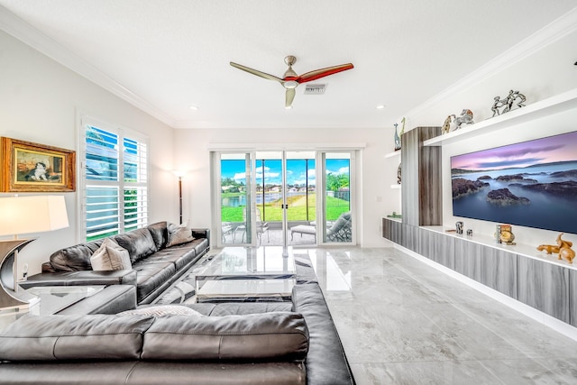 living area with crown molding, a healthy amount of sunlight, a ceiling fan, and visible vents