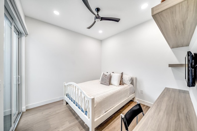 bedroom with baseboards, recessed lighting, wood finished floors, and a ceiling fan