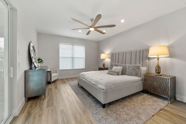 bedroom with recessed lighting, baseboards, a ceiling fan, and light wood-type flooring