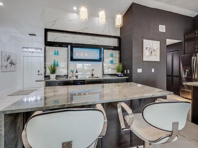8540 Lake Cypress Rd, Lake Worth, FL 33467 - bar featuring visible vents, stainless steel refrigerator with ice dispenser, a chandelier, marble finish floor, and hanging light fixtures