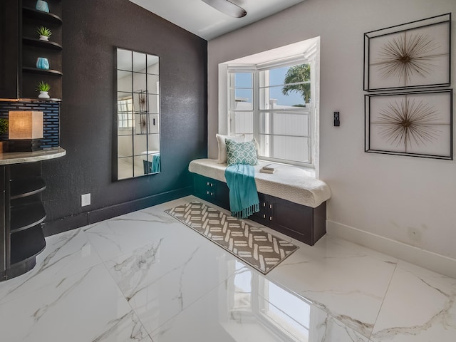 8540 Lake Cypress Rd, Lake Worth, FL 33467 - interior space with marble finish floor, baseboards, and a textured wall