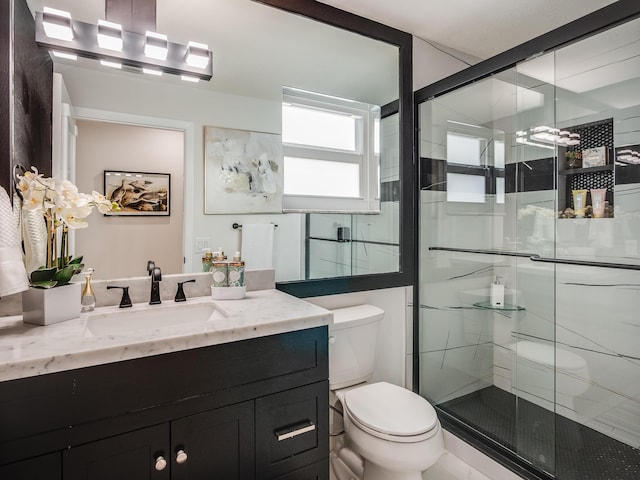 8540 Lake Cypress Rd, Lake Worth, FL 33467 - bathroom featuring a shower stall, vanity, and toilet