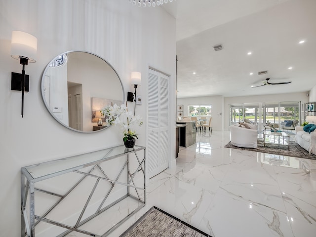 8540 Lake Cypress Rd, Lake Worth, FL 33467 - hall with marble finish floor, visible vents, and recessed lighting