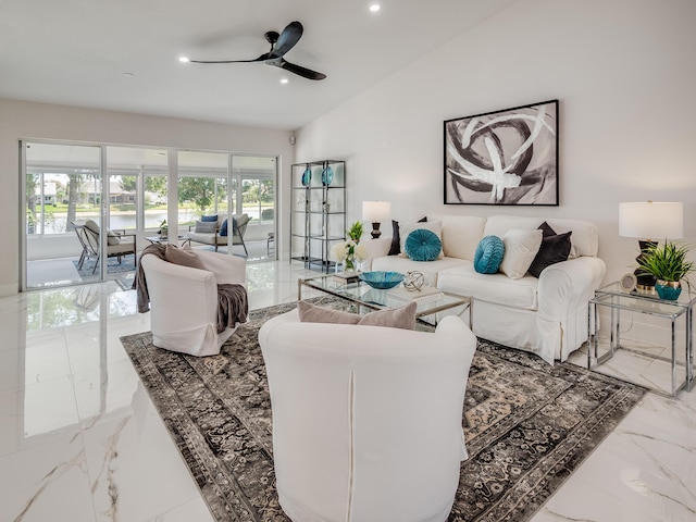 8540 Lake Cypress Rd, Lake Worth, FL 33467 - living room with ceiling fan, recessed lighting, marble finish floor, and vaulted ceiling