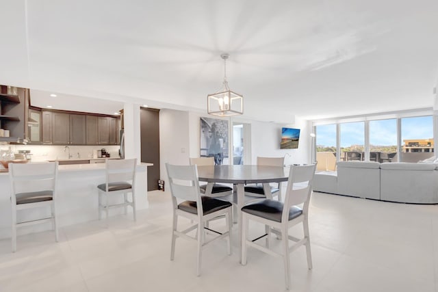 dining room featuring recessed lighting