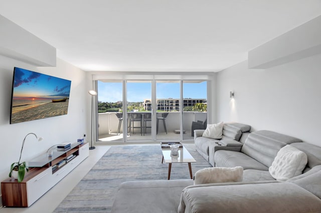 living area featuring baseboards
