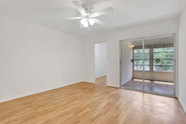 3034 Oakridge D 3034, Deerfield Beach, FL 33442 - spare room with light wood finished floors, baseboards, and ceiling fan