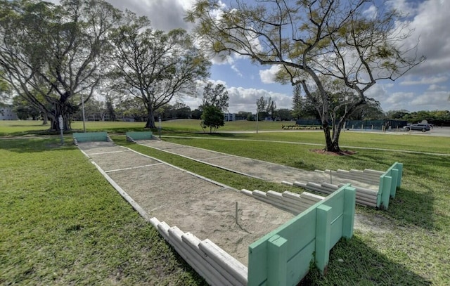 3034 Oakridge D 3034, Deerfield Beach, FL 33442 - surrounding community with a yard