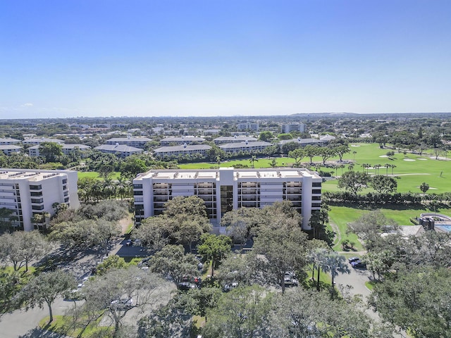 bird's eye view with view of golf course
