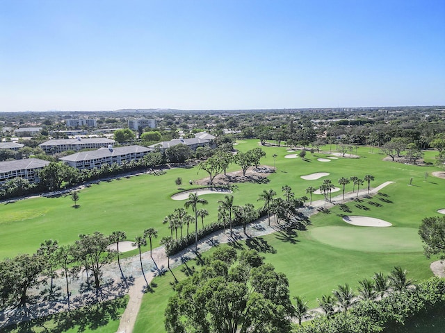 birds eye view of property with view of golf course
