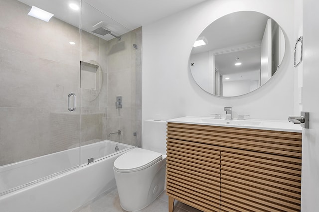 bathroom with tile patterned flooring, vanity, a combined bath / shower with rainfall shower, and toilet