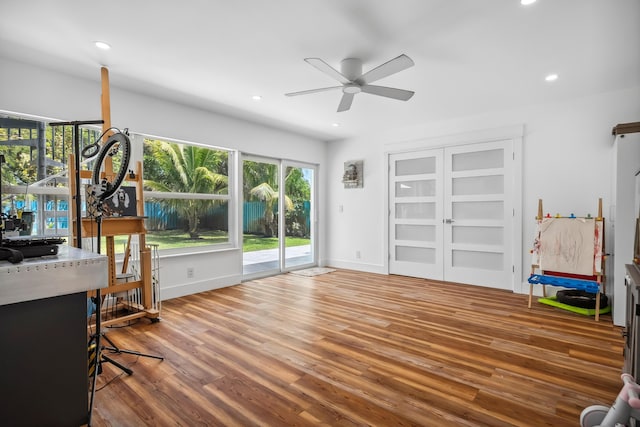 office space with a ceiling fan, baseboards, recessed lighting, and wood finished floors