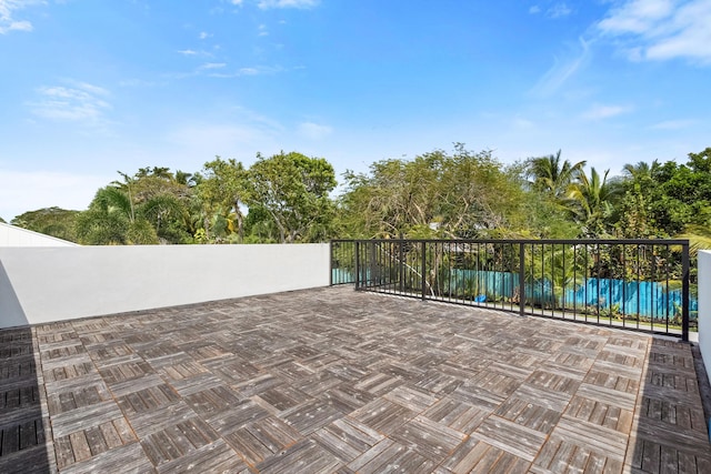 view of patio / terrace featuring fence