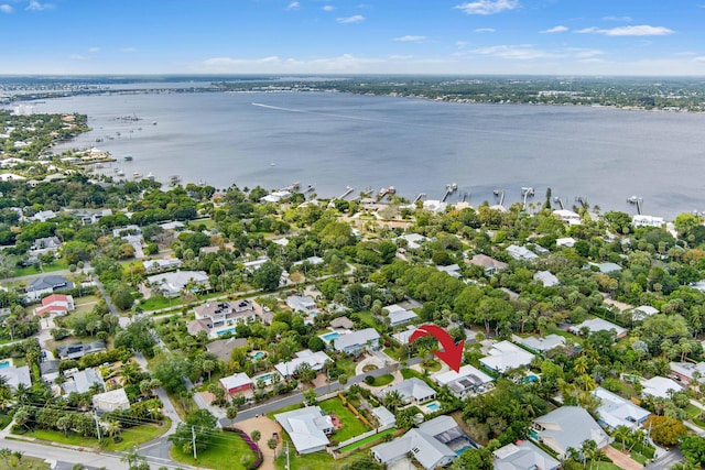 aerial view featuring a residential view and a water view