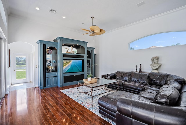 living room featuring crown molding, ceiling fan, visible vents, recessed lighting, and dark wood-style flooring