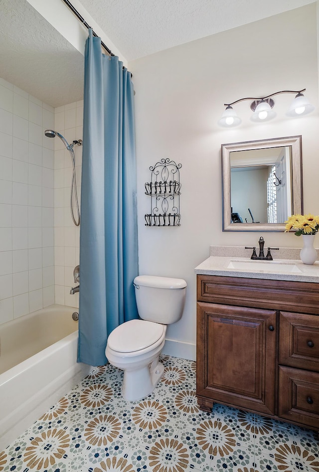 bathroom with vanity, baseboards, shower / tub combo with curtain, a textured ceiling, and toilet