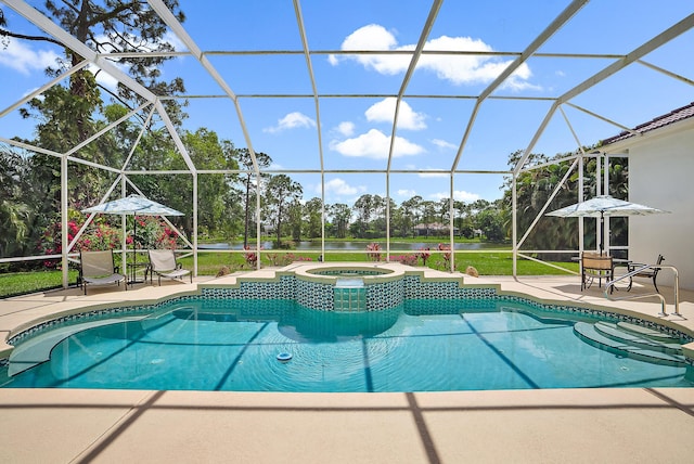view of swimming pool with a patio, a pool with connected hot tub, and glass enclosure