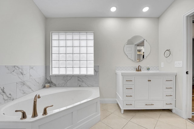 6298 Via Primo St, Lake Worth, FL 33467 - bathroom featuring a bath, vanity, baseboards, and tile patterned flooring