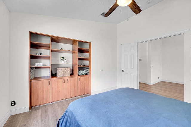 6298 Via Primo St, Lake Worth, FL 33467 - bedroom featuring light wood-style flooring, a ceiling fan, and baseboards