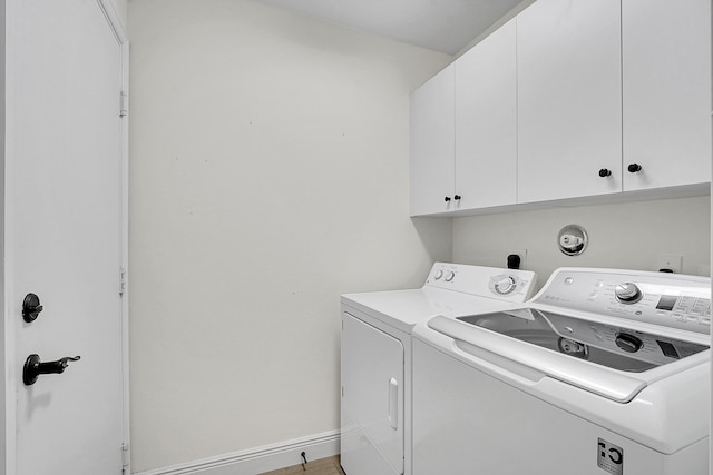 6298 Via Primo St, Lake Worth, FL 33467 - clothes washing area with washer and dryer and cabinet space