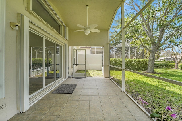 6298 Via Primo St, Lake Worth, FL 33467 - unfurnished sunroom featuring a ceiling fan