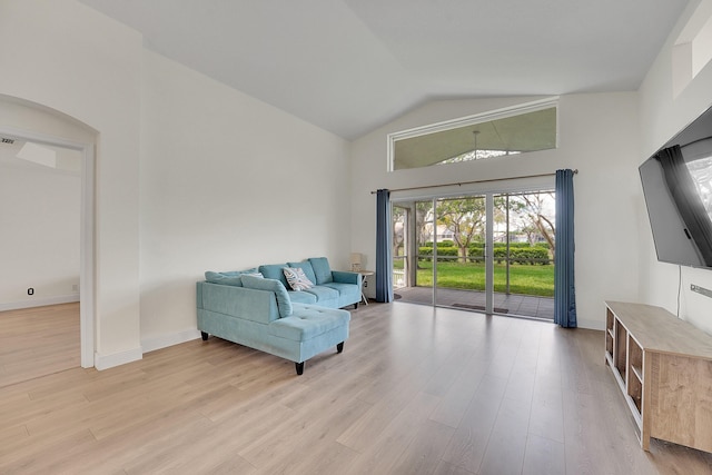 6298 Via Primo St, Lake Worth, FL 33467 - sitting room with high vaulted ceiling, plenty of natural light, and light wood-style floors