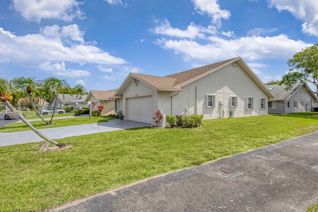 view of front of home featuring stucco siding, driveway, a front lawn, and an attached garage