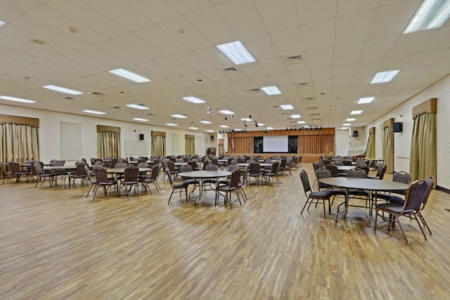 dining space with light wood-type flooring