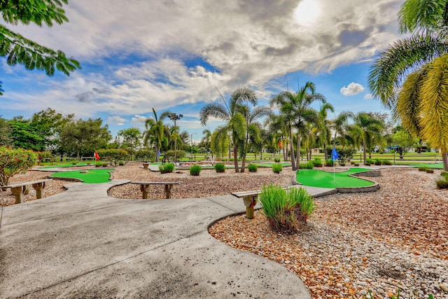 surrounding community with a putting area