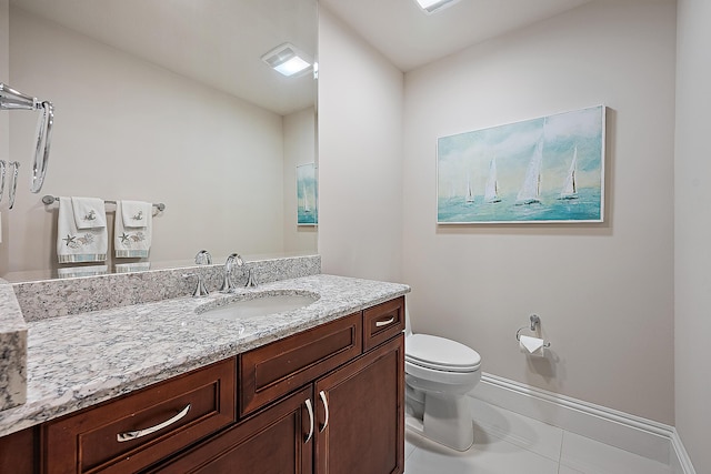 621 Bay Colony Drive S & Slip 13, Juno Beach, FL 33408 - bathroom featuring toilet, vanity, baseboards, and tile patterned floors