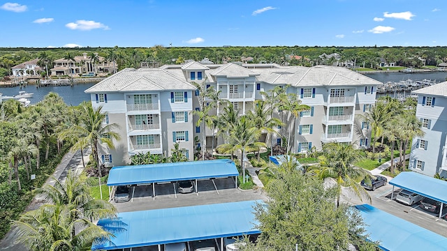 621 Bay Colony Drive S & Slip 13, Juno Beach, FL 33408 - aerial perspective of suburban area featuring a nearby body of water