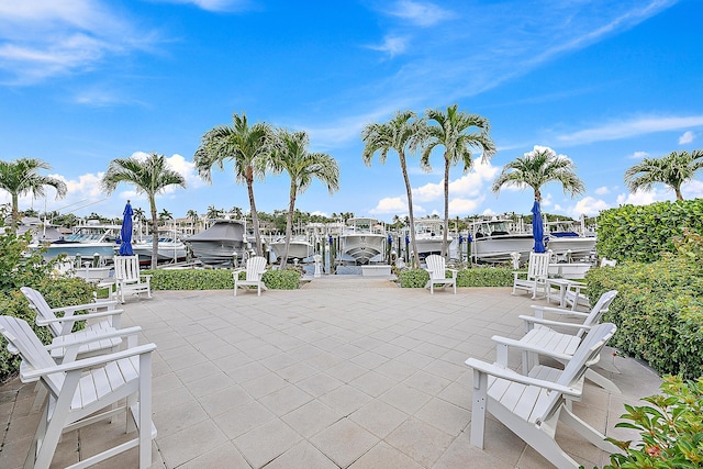 621 Bay Colony Drive S & Slip 13, Juno Beach, FL 33408 - view of patio with boat lift and a dock
