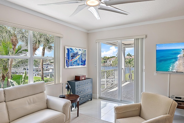 621 Bay Colony Drive S & Slip 13, Juno Beach, FL 33408 - living area featuring a ceiling fan, ornamental molding, light tile patterned floors, and baseboards