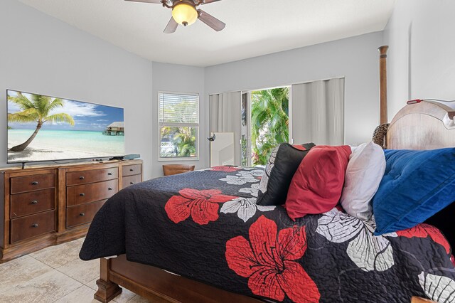 2111 Bellcrest Ct, Royal Palm Beach, FL 33411 - bedroom with a ceiling fan, access to outside, and light tile patterned floors