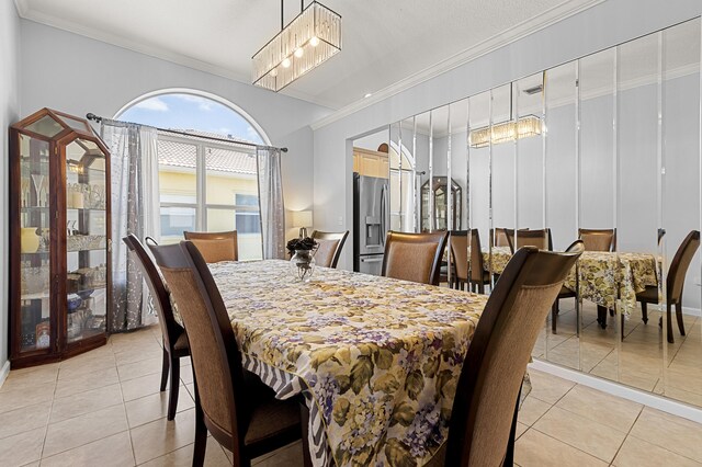 2111 Bellcrest Ct, Royal Palm Beach, FL 33411 - dining space with light tile patterned floors, ornamental molding, and baseboards