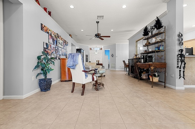 2111 Bellcrest Ct, Royal Palm Beach, FL 33411 - sitting room featuring ceiling fan, recessed lighting, light tile patterned floors, crown molding, and baseboards