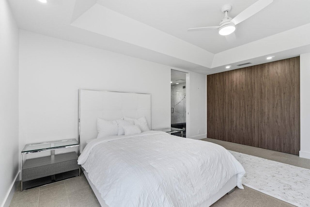 6878 Touchstone Cir, Palm Beach Gardens, FL 33418 - bedroom featuring visible vents, recessed lighting, ceiling fan, a tray ceiling, and baseboards