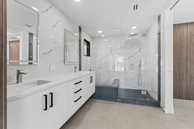 6878 Touchstone Cir, Palm Beach Gardens, FL 33418 - bathroom with a marble finish shower, recessed lighting, double vanity, and a sink