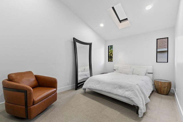 6878 Touchstone Cir, Palm Beach Gardens, FL 33418 - bedroom with baseboards, light carpet, recessed lighting, and vaulted ceiling with skylight