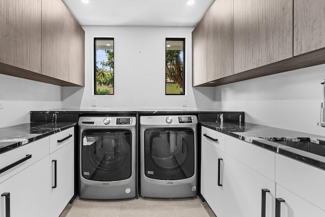 6878 Touchstone Cir, Palm Beach Gardens, FL 33418 - clothes washing area featuring washing machine and dryer, recessed lighting, and cabinet space
