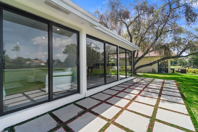 6878 Touchstone Cir, Palm Beach Gardens, FL 33418 - view of patio with a sunroom