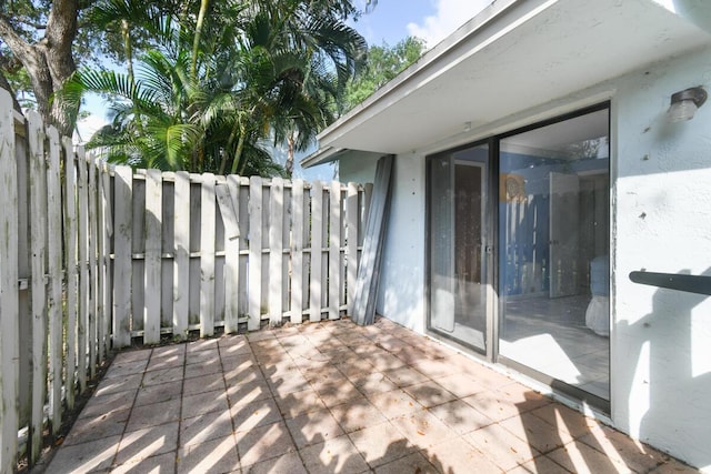 431 Jupiter Lakes Blvd Unit 2113C, Jupiter, FL 33458 - view of patio featuring fence