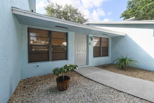 431 Jupiter Lakes Blvd Unit 2113C, Jupiter, FL 33458 - property entrance featuring stucco siding