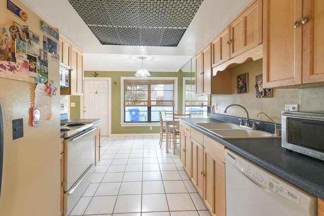 431 Jupiter Lakes Blvd Unit 2113C, Jupiter, FL 33458 - kitchen featuring white appliances, baseboards, a sink, light tile patterned floors, and hanging light fixtures