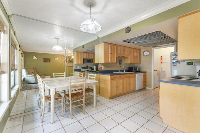 431 Jupiter Lakes Blvd Unit 2113C, Jupiter, FL 33458 - kitchen featuring a sink, dark countertops, washer / dryer, and white appliances