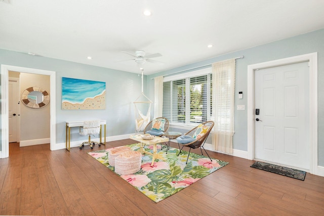 dining space featuring recessed lighting, hardwood / wood-style flooring, baseboards, and an inviting chandelier