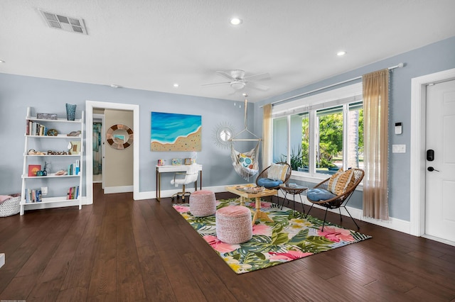 living room featuring recessed lighting, a ceiling fan, baseboards, and dark wood-style flooring